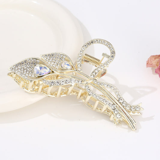Rhinestone leaf hair claw